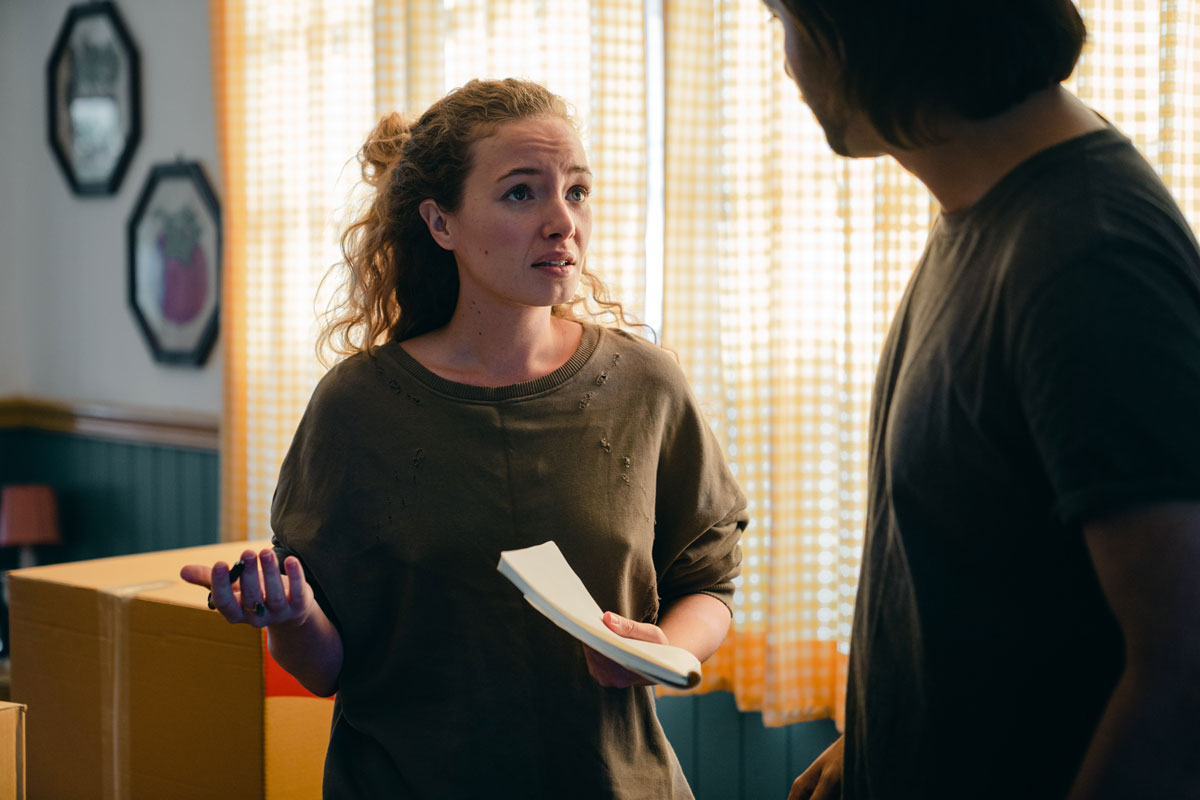 Couple stressed looking at electricity bill